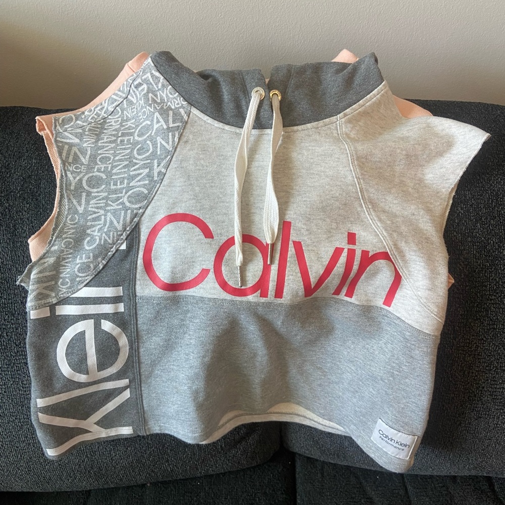 2 Calvin Klein sleeveless crop hoodies